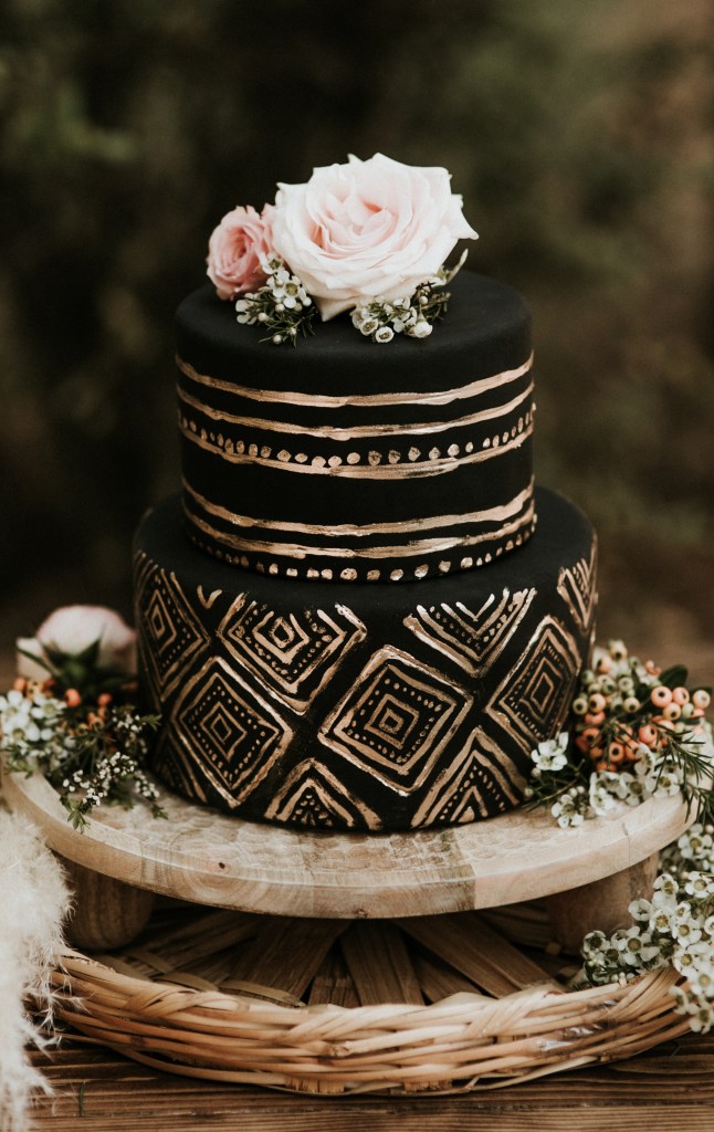 Postpone Your Wedding Different Season Black Round two tiered Cake Gold Details Brown Wooden cake stand